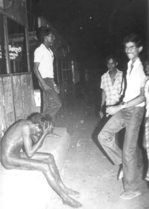 A Tamil youth stripped naked by Sinhalese rioters near the Borella bus stand in Colombo during Black July.