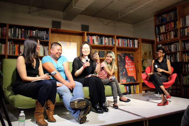 Four Asian authors sit on a long green couch; to the left of them, the moderator, a South Asian woman, sits in a red chair.