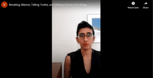 YouTube screenshot featuring Vyshali next to a dresser in front of a white wall with a hanging photograph.