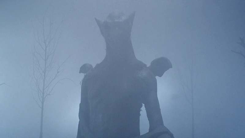 Screencap of a statue in the mist from The Shrine (2010)
